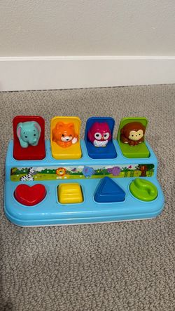 Pop up animal activity toy
