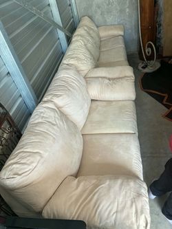 Microfiber sofa bed and loveseat.