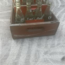 Old Coca-Cola Bottles And Wood Crate