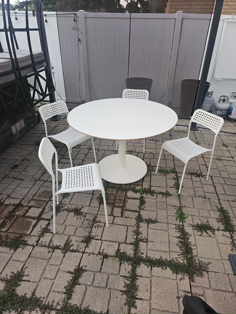 Table and four chairs