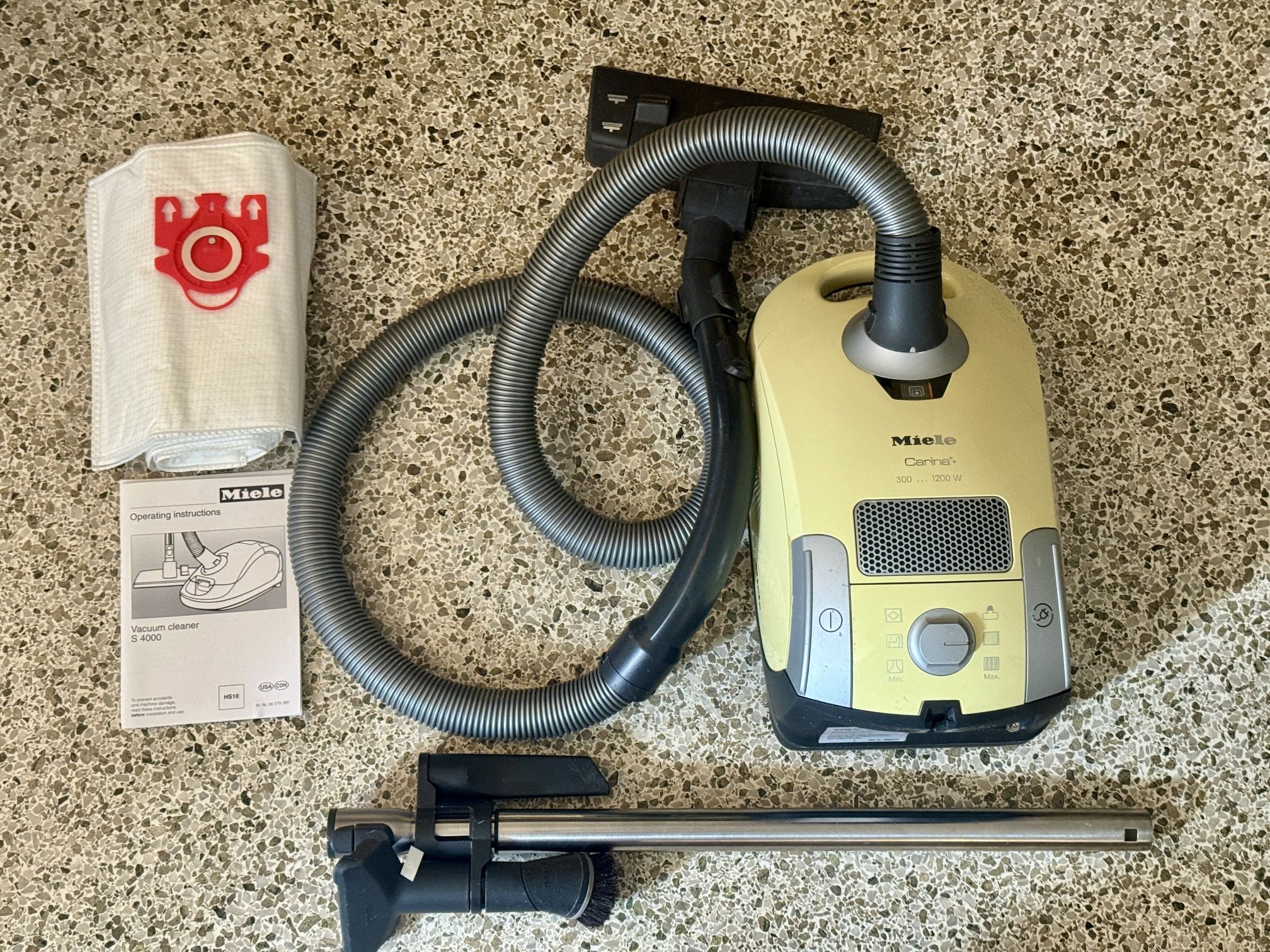 Miele Carina Canister Vacuum + Accessories $75