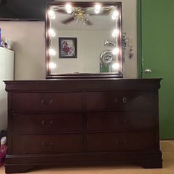 Dresser with mirror and light