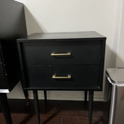 Modern black 2-drawer nightstand with brass hardware