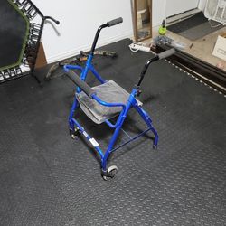 Near perfect condition dark blue walker. Includes lift up seat And is collapsible And height is adju