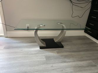 Coffee table with glass top
