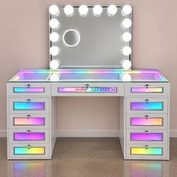 Beautiful white vanity featuring 11 spacious drawers, built-in LED lighting on every drawer and the top, plus a Bluetooth speaker mirror