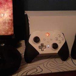 Xbox Series X and 4 controllers And Gaming Chair