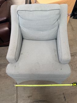 Light blue swivel rocker chair