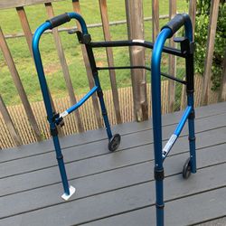 Medline adjustable, folding walker with wheels.  In awesome condition!