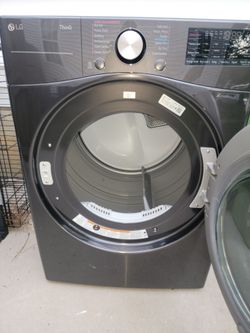 LG WASHER AND STEAM DRYER