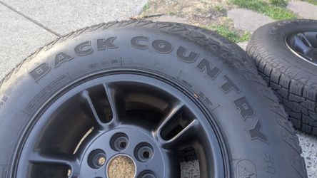 Almost new back country tires w/OEM 15"Dodge Durango wheels