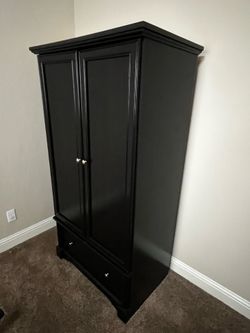 Black armoire