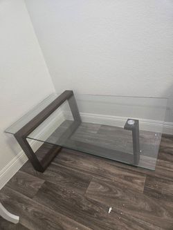 the Bristow Glass Top Rectangular Coffee Table by Magnussen Home Furnishings