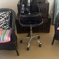Black rolling chair goes up and down