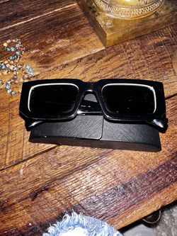 PRADA SUNGLASSES