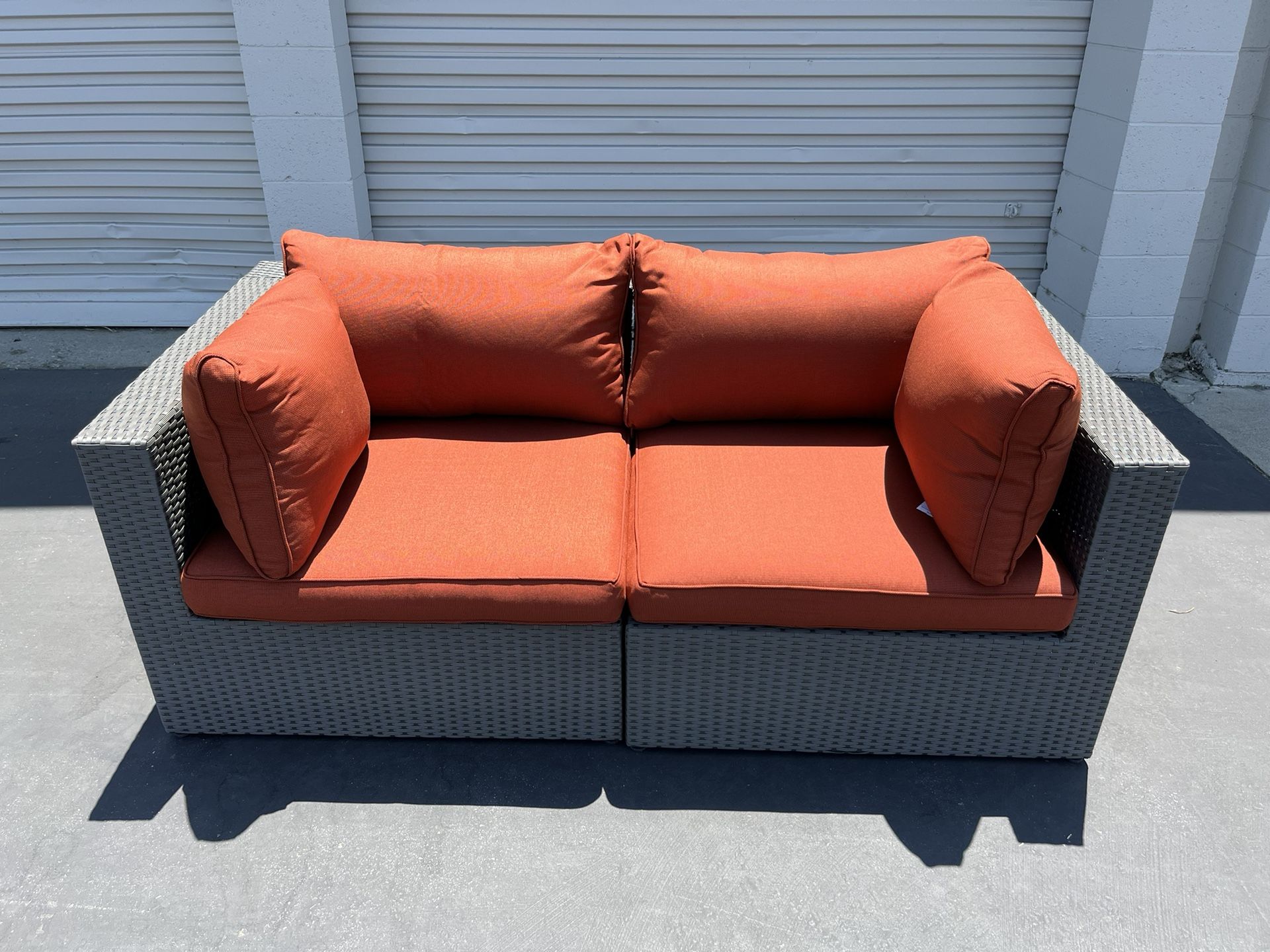 2Piece Wide Wicker Outdoor Loveseat with Orange Cushions for Sale in