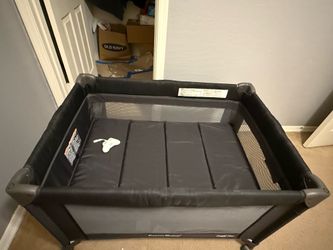 Pamo Babe Portable Baby Play Yard with diaper station and bassinet