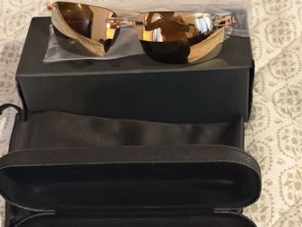 Revo Rimless Sunglasses with Gold Mirrored Lenses