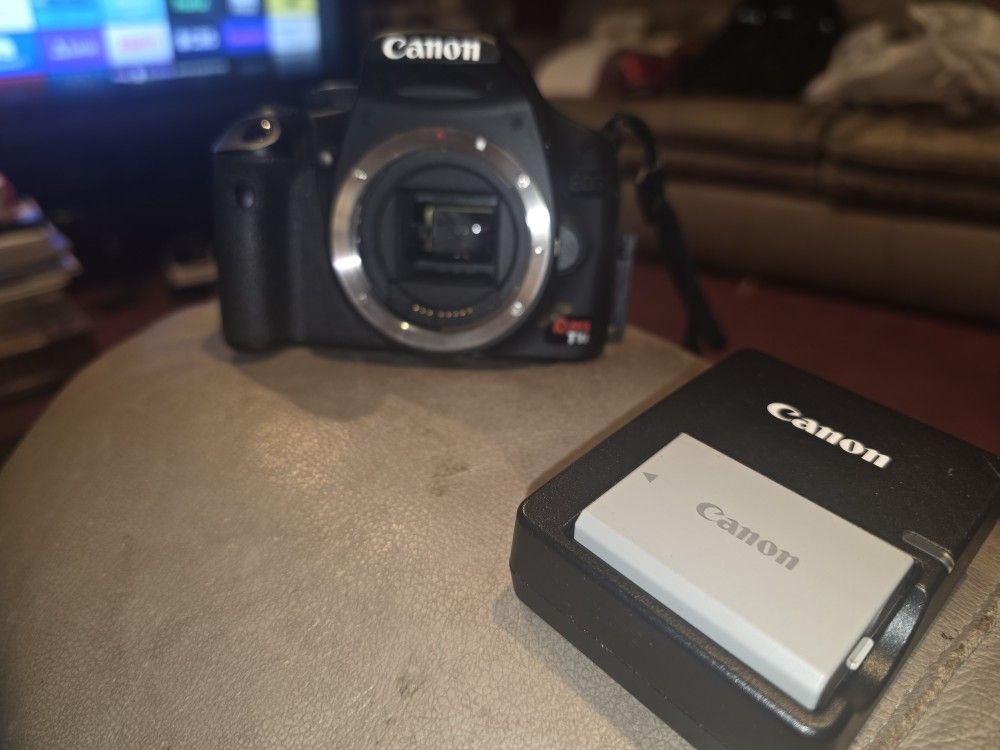 Cannon Eos Digital Rebel T1i DSLR Camera+Video With Camera Strap,Memory card.