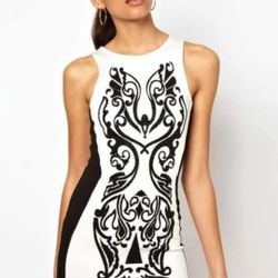 Beautiful River Island Women's Black and White short Dress Used in good condition Small measure 28" length and 12" width aprox. 