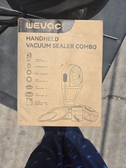 Handheld vacuum sealer