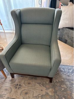 Turquoise wing back chair