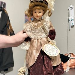 Crowne Fine Porcelain Dolls