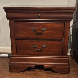 2 drawer Nightstand in cherry finish. Has thin top 3rd drawer. 17” depth x 26” length x 27” tall