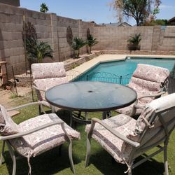 Table And 4 Chairs With Cushions