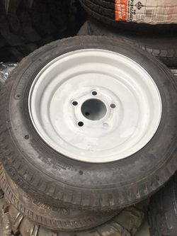 One trailer tire 4.80-12 with rim $60