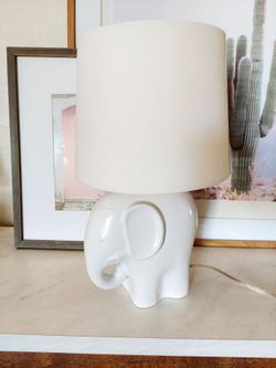 Small elephant table lamp with fabric white shade