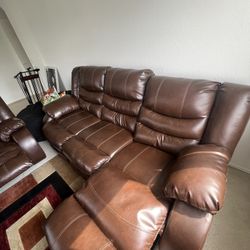 Two Faux Leather Sofas / Couches With Recliner
