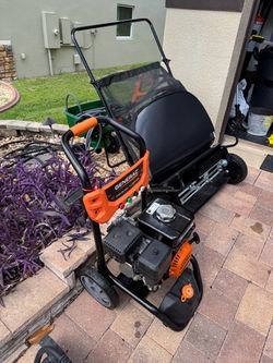 Pressure washer/ leaf vacuum and seed spreader