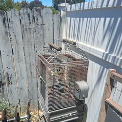 Birdcage With Rooftop Home