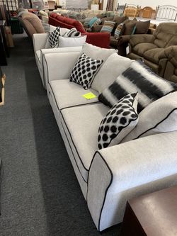 Gray/ black sofa and love delta furniture