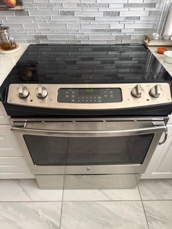 Glass top slide in range/stove