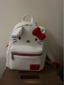 Hello kitty loungefly, white and red backpack, medium sized