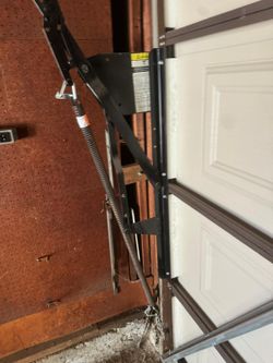 Garage Door Broken Spring Opener Off Track Adjustment Replace And Parts 