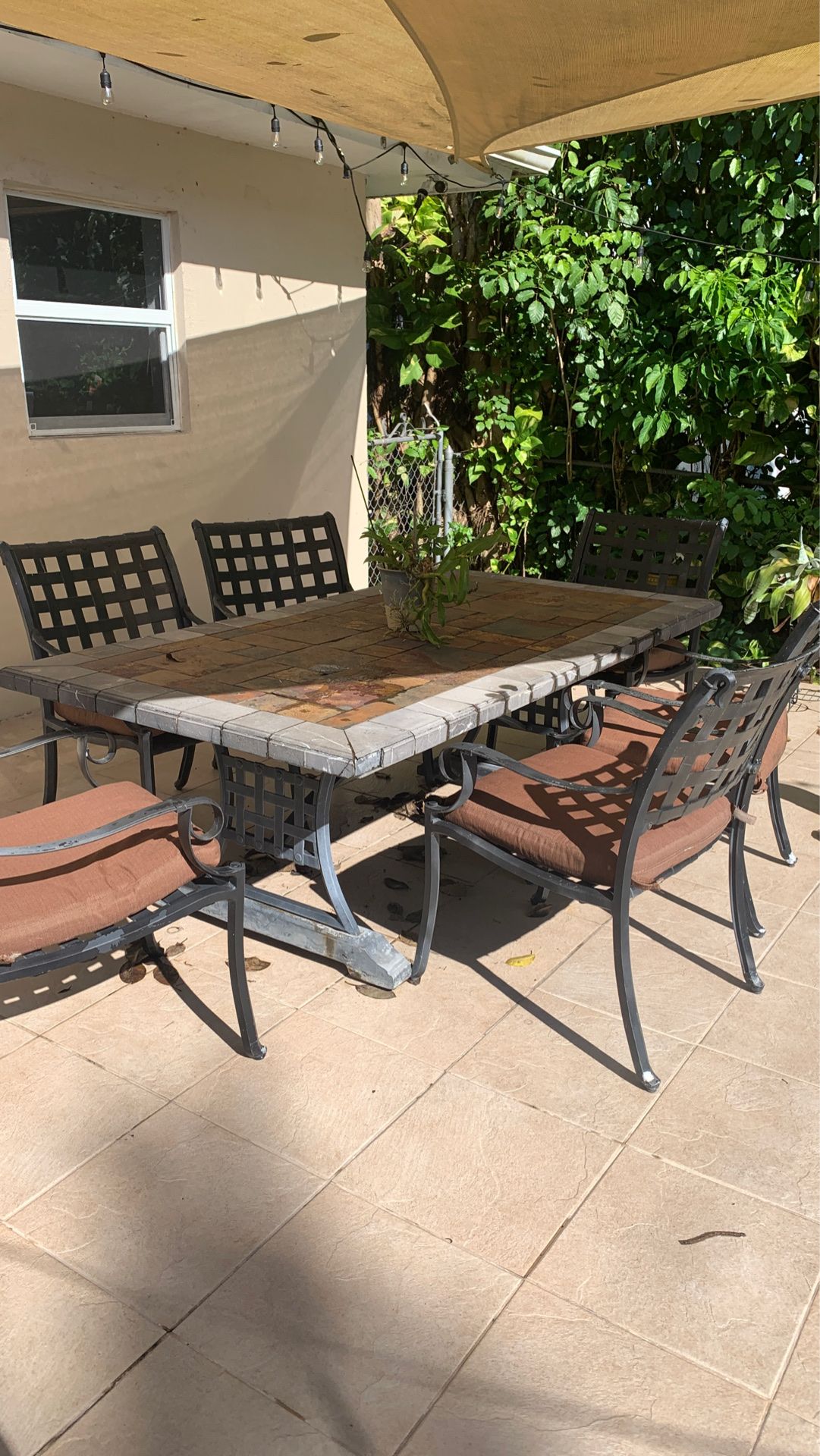 Outdoor patio dining set with 6 chairs and cushions