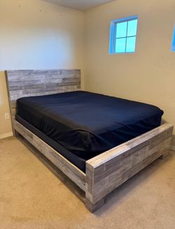 Queen sized bed + frame with drawer included