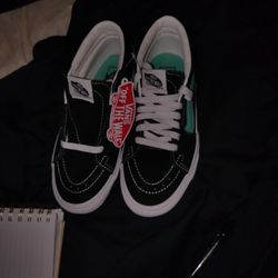 Vans  Sk8-Mid Classic Sport sneakers in black and waterfall (teal). 