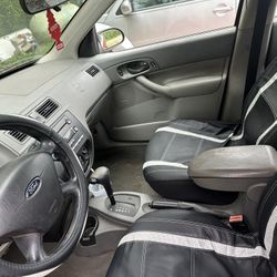 Red 2005 Ford Focus 4D
