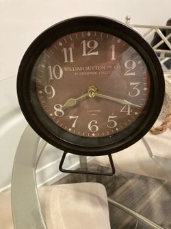 William Sutton and co metal 7 inch battery clock