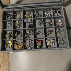 Around 47 Sets Among Rings, Earrings, Brooches. All In Good Condition Displayed In a Jewelry Box. 