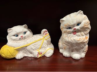 Hand-painted ceramic cats, one sitting up is10”