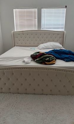 King size bed frame. No mattress included.