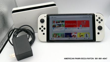 Nintendo Switch OLED Handheld Console w/ White Joy-Con (HEG-001) with dock, charger, case in good used condition. 