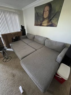 Gray L-Shaped Couch with Ottoman