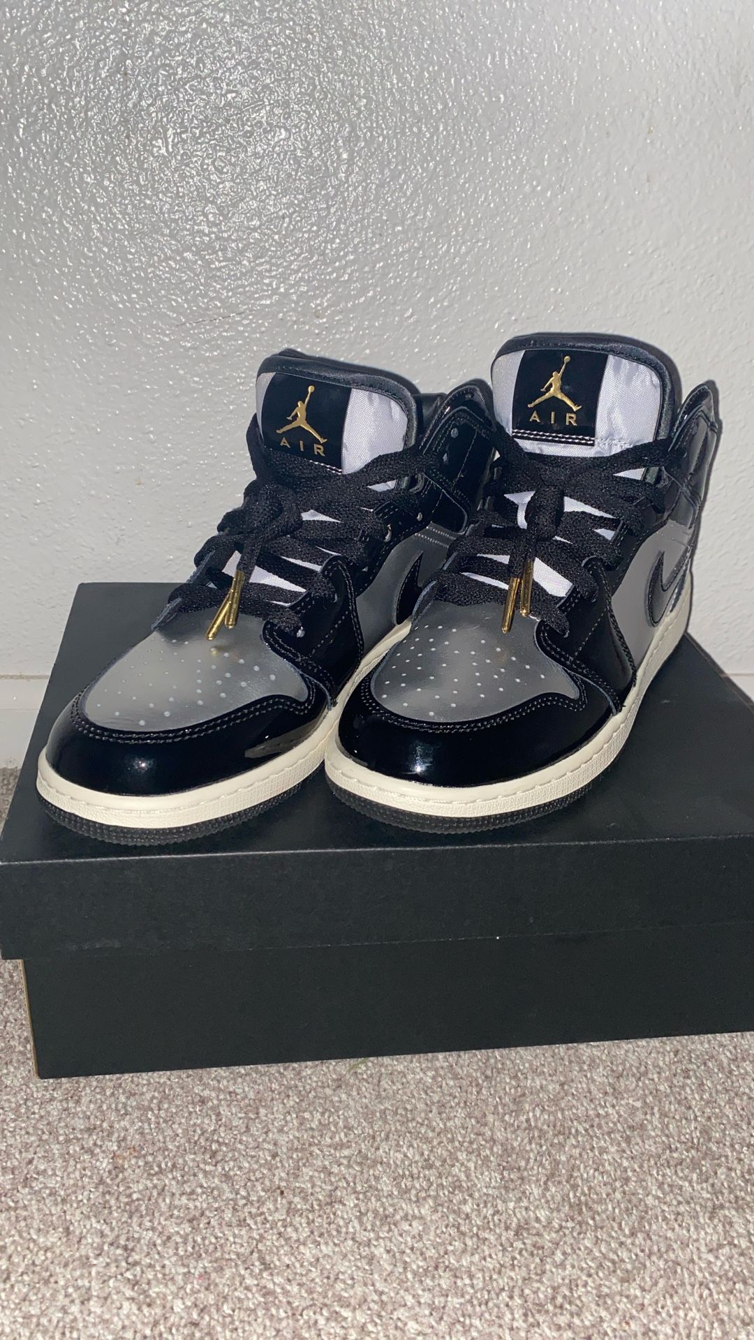 Black/Metallic Gold Air Jordan’s