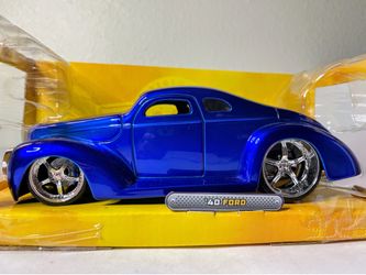 1:24 scale diecast 1940 Ford Coupe street rod. $30.00 cash buys it